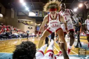 Nebraska Cornhusker forward Josiah Allick (53) runs over to help Jamarques Lawrence in the second half against the Oregon State Beavers during the basketball game on Saturday, November 18, 2023, in Sioux Falls, South Dakota. Photo by John S. Peterson.