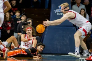 Nebraska Cornhusker forward Josiah Allick (53) throws the ball to forward Rienk Mast (51) against the Oregon State Beavers in the first half during the basketball game on Saturday, November 18, 2023, in Sioux Falls, South Dakota. Photo by John S. Peterson.