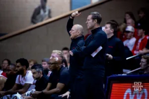 Nebraska Cornhusker head coach Fred Hoiberg and assistant Nate Loenser react to the action on the court against the Oregon State Beavers in the first half during the basketball game on Saturday, November 18, 2023, in Sioux Falls, South Dakota. Photo by John S. Peterson.