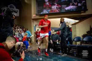 Nebraska Cornhusker guard Jarron Coleman (9) runs out of the lockerroom before the basketball game against the Oregon State Beavers on Saturday, November 18, 2023, in Sioux Falls, South Dakota. Photo by John S. Peterson.