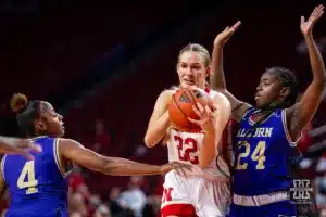 Nebraska Cornhusker forward Natalie Potts (22) drives towards the basket against Alcorn State Lady Brave guard Kailyn Watkins (4) and guard Kiarra Henderson (24) in the second half during the basketball game on Tuesday, November 14, 2023, in Lincoln, Nebraska. Photo by John S. Peterson.
