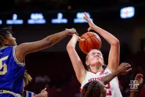 Nebraska Cornhusker forward Jessica Petrie (12) is fouled by Alcorn State Lady Brave forward Destiny Brown (5) in the second half during the basketball game on Tuesday, November 14, 2023, in Lincoln, Nebraska. Photo by John S. Peterson.