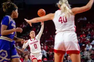 Nebraska Cornhusker guard Darian White (0) make a pass to center Alexis Markowski (40) in the second half against the Alcorn State Lady Braves during the basketball game on Tuesday, November 14, 2023, in Lincoln, Nebraska. Photo by John S. Peterson.