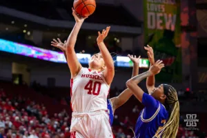 Nebraska Cornhusker center Alexis Markowski (40) makes a layup against Alcorn State Lady Brave guard Kiarra Henderson (24) in the first half during the basketball game on Tuesday, November 14, 2023, in Lincoln, Nebraska. Photo by John S. Peterson.