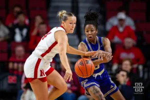 Nebraska Cornhusker guard Callin Hake (14) steals the ball away from Alcorn State Lady Brave guard Jazmine Jackson (0) in the first half during the basketball game on Tuesday, November 14, 2023, in Lincoln, Nebraska. Photo by John S. Peterson.