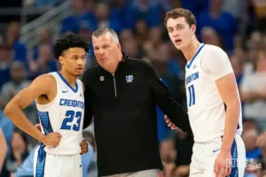 Creighton Bluejays head coach Greg McDermot talks with Creighton Bluejays guard Trey Alexander