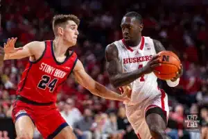 Nebraska Cornhusker forward Juwan Gary (4) drives to the basket against Stony Brook Seawolf guard Jared Frey (24) in the first half during the basketball game on Wednesday, November 15, 2023, in Lincoln, Nebraska. Photo by John S. Peterson.