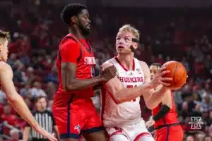 Nebraska Cornhusker forward Rienk Mast (51) drives toward the basket against Stony Brook Seawolf forward Chris Maidoh (4) in the first half during the basketball game on Wednesday, November 15, 2023, in Lincoln, Nebraska. Photo by John S. Peterson.