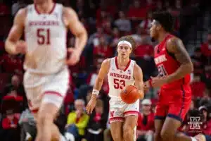 Nebraska Cornhusker forward Josiah Allick (53) dribbles the ball down the court against Stony Brook Seawolf guard Andre Snoddy (21) in the first half during the basketball game on Wednesday, November 15, 2023, in Lincoln, Nebraska. Photo by John S. Peterson.