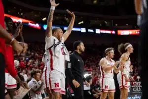 Nebraska Cornhusker guard C.J. Wilcher (0) celebrates Jamarques Lawrence dunk in the second half against the Stony Brook Seawolves during the basketball game on Wednesday, November 15, 2023, in Lincoln, Nebraska. Photo by John S. Peterson.
