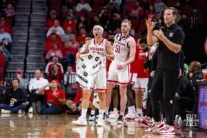 Nebraska Cornhusker bench celebrates a basket against the Stony Brook Seawolves in the first half during the basketball game on Wednesday, November 15, 2023, in Lincoln, Nebraska. Photo by John S. Peterson.