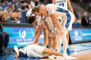 Creighton Bluejays looks over Creighton Bluejays guard Trey Alexander