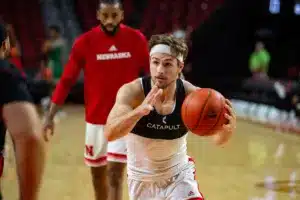 Nebraska Cornhusker guard Sam Hoiberg (1) makes a layup warming up for Florida A
