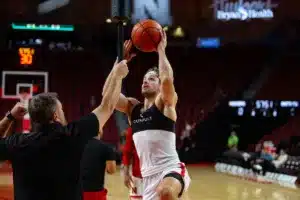 Nebraska Cornhusker guard Sam Hoiberg (1) makes a layup warming up for Florida A