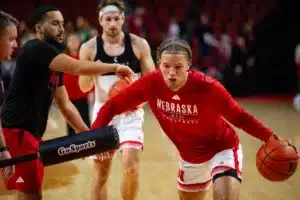 Nebraska Cornhusker guard Eli Rice (11) makes a layup warming up for against the Florida A