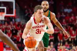 Nebraska Cornhusker guard Cale Jacobsen (31) drives to the basket for a layup against the Florida A