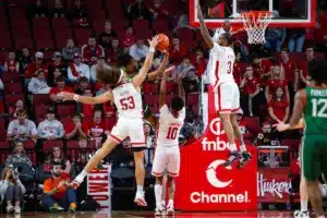 Nebraska Cornhusker forward Josiah Allick (53) blocks a shot against the Florida A