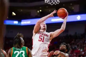 Nebraska Cornhusker forward Rienk Mast (51) drives to the basket for a layup against Florida A