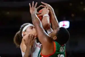 Nebraska Cornhusker forward Josiah Allick (53) battles against Florida A