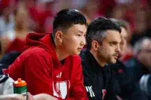 Nebraska Cornhusker guard Keisei Tominaga (30) sitting on the bench out with an injury against the Florida A
