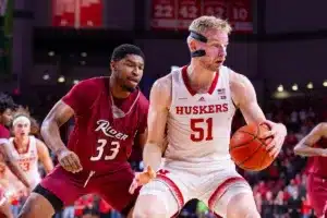 Nebraska Cornhusker forward Rienk Mast (51) dribbles the ball against Rider Bronc forward Tariq Ingraham (33) in the first half during the basketball game on Monday, November 13, 2023, in Lincoln, Nebraska. Photo by John S. Peterson.