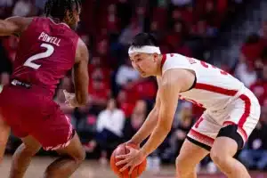 Nebraska Cornhusker guard Keisei Tominaga (30) dribbles the ball against Rider Bronc guard Allen Powell (2) in the first half during the basketball game on Monday, November 13, 2023, in Lincoln, Nebraska. Photo by John S. Peterson.