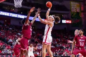 Nebraska Cornhusker forward Josiah Allick (53) puts up a layup against Rider Bronc forward JT Langston Jr. (14) in the first half during the basketball game on Monday, November 13, 2023, in Lincoln, Nebraska. Photo by John S. Peterson.