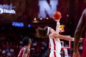 Nebraska Cornhusker forward Josiah Allick (53) reaches for the ball against the Rider Broncs in the first half during the basketball game on Monday, November 13, 2023, in Lincoln, Nebraska. Photo by John S. Peterson.