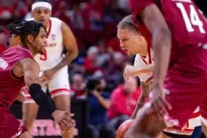 Nebraska Cornhusker guard Eli Rice (11) dribbles the ball against the Rider Broncs in the first half during the basketball game on Monday, November 13, 2023, in Lincoln, Nebraska. Photo by John S. Peterson.