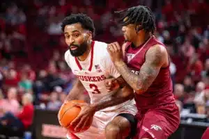 Nebraska Cornhusker guard Brice Williams (3) dribbles the ball against the Rider Broncs in the second half during the basketball game on Monday, November 13, 2023, in Lincoln, Nebraska. Photo by John S. Peterson.