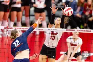 Nebraska Cornhusker Merritt Beason (13) tries to block Illinois Fighting Illini Raina Terry (12) in the second set during the volleyball match on Sunday, November 12, 2023, in Lincoln, Nebraska. Photo by John S. Peterson.