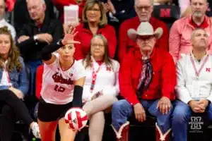 Nebraska Cornhusker Merritt Beason (13) serves the ball against the Illinois Fighting Illini in the second set during the volleyball match on Sunday, November 12, 2023, in Lincoln, Nebraska. Photo by John S. Peterson.