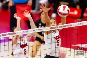 Nebraska Cornhusker Bekka Allick (5) and Nebraska Cornhusker Bergen Reilly (2) jump to block Illinois Fighting Illini in the first set during the volleyball match on Sunday, November 12, 2023, in Lincoln, Nebraska. Photo by John S. Peterson.