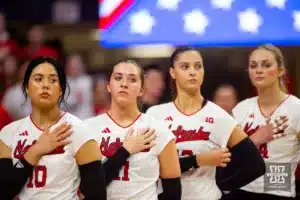 Nebraska Cornhusker standing for the National Anthem before the volleyball match against the Illinois Fighting Illini on Sunday, November 12, 2023, in Lincoln, Nebraska. Photo by John S. Peterson.