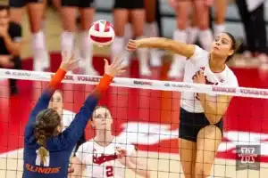 Nebraska Cornhusker Bekka Allick (5) spikes the ball against Illinois Fighting Illini Cari Bohm (11) in the second set during the volleyball match on Sunday, November 12, 2023, in Lincoln, Nebraska. Photo by John S. Peterson.