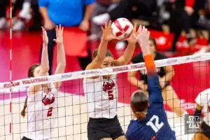 Nebraska Cornhusker Bekka Allick (5) blocks a shot by Illinois Fighting Illini Raina Terry (12) in the first set during the volleyball match on Sunday, November 12, 2023, in Lincoln, Nebraska. Photo by John S. Peterson.