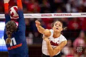 Nebraska Cornhusker Bekka Allick (5) scores a point against Illinois Fighting Illini Cari Bohm (11) in the fourth set during the volleyball match on Sunday, November 12, 2023, in Lincoln, Nebraska. Photo by John S. Peterson.