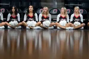 Omaha Mavericks cheerleaders watch the action during a game between College of Saint Mary and the UN-Omaha in Omaha, NE on Wednesday November 8th, 2023. . Photo by Eric Francis