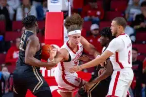 Nebraska Cornhuskers forward Josiah Allick (53) and guard C.J. Wilcher (0) fight for the ball against the Lindenwood Lions in the first half during a college basketball game on Monday, November 6, 2023, in Lincoln, Nebraska. Photo by John S. Peterson.