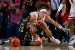 Nebraska Cornhuskers forward Josiah Allick (53) fights for the ball against Lindenwood Lion guard Darius Beane (25) in the first half during a college basketball game on Monday, November 6, 2023, in Lincoln, Nebraska. Photo by John S. Peterson.