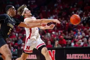 Nebraska Cornhuskers guard Sam Hoiberg (1) makes a pass against Lindenwood Lion forward Jaylon McDaniel (5) in the second half during a college basketball game on Monday, November 6, 2023, in Lincoln, Nebraska. Photo by John S. Peterson.