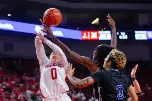 Nebraska Cornhuskers guard Darian White (0) is fouled trying to make a layup against the Northwestern State Lady Demons in the first quarter during a college basketball game on Monday, November 6, 2023, in Lincoln, Nebraska. Photo by John S. Peterson.