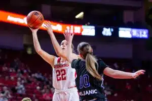 Nebraska Cornhuskers forward Natalie Potts (22) puts up a layup against Northwestern State Lady Demons guard Ivona Miljanic (10) in the second quarter during a college basketball game on Monday, November 6, 2023, in Lincoln, Nebraska. Photo by John S. Peterson.