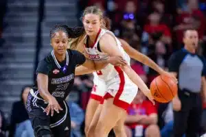 Nebraska Cornhuskers forward Natalie Potts (22) steals the ball away from Northwestern State Lady Demons guard Jordan Brown (23) in the fourth quarter during a college basketball game on Monday, November 6, 2023, in Lincoln, Nebraska. Photo by John S. Peterson.