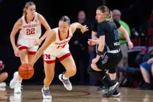 Nebraska Cornhuskers guard Callin Hake (14) steals the ball away from Northwestern State Lady Demons guard Ivona Miljanic (10) in the fourth quarter during a college basketball game on Monday, November 6, 2023, in Lincoln, Nebraska. Photo by John S. Peterson.