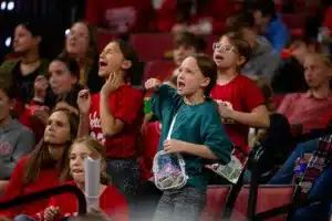 Nebraska Cornhuskers singing along with a Taylor Swift song at a break in the action against the Northwestern State Lady Demons in the fourth quarter during a college basketball game on Monday, November 6, 2023, in Lincoln, Nebraska. Photo by John S. Peterson.