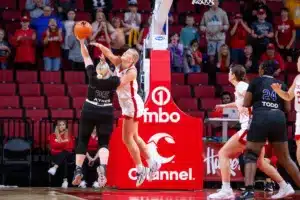 Nebraska Cornhuskers forward Jessica Petrie (12) tries to block a shot from Northwestern State Lady Demons guard Sharna Ayres (35) in the fourth quarter during a college basketball game on Monday, November 6, 2023, in Lincoln, Nebraska. Photo by John S. Peterson.