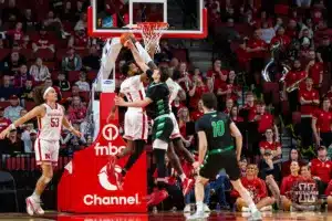 Nebraska Cornhusker guard Brice Williams (3) and forward Juwan Gary (4) battel for a rebound against North Dakota Fighting Hawks player in the second half during a college basketball game Wednesday, December 20, 2023, in Lincoln, Nebraska. Photo by John S. Peterson.