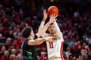 Nebraska Cornhusker guard Eli Rice (11) takes a shot against North Dakota Fighting Hawk forward Tsotne Tsartsidze (10) in the first half during a college basketball game Wednesday, December 20, 2023, in Lincoln, Nebraska. Photo by John S. Peterson.