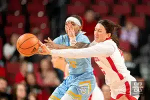 n24 knocks the pass from Southern Lady Jaguars center Xyllize Harrison